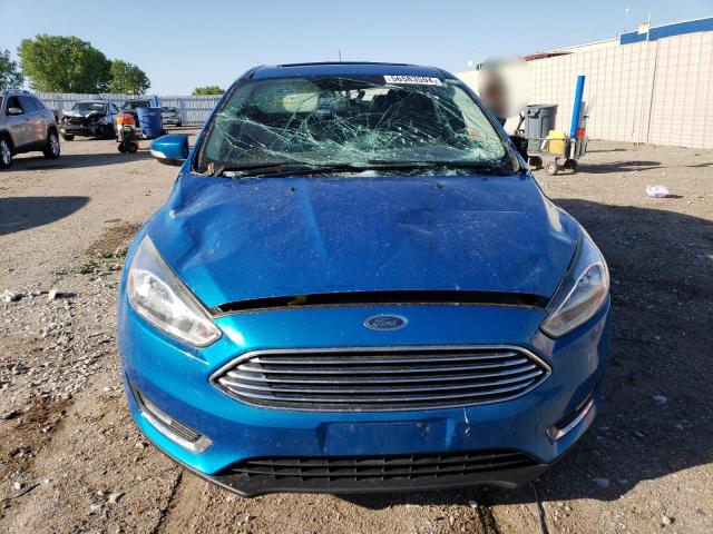 Photo 5 from auction – 2015 FORD FOCUS TITA with VIN 1FADP3J26FL363673