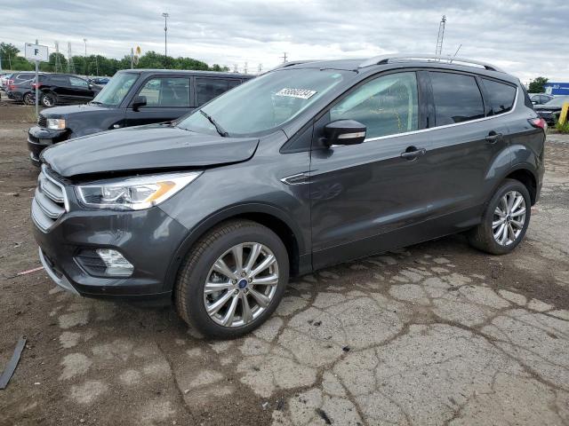 FORD ESCAPE TIT 2018 with VIN 1FMCU0J95JUB71136 - Photo from auction