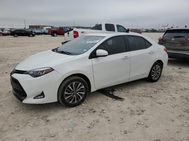 TOYOTA COROLLA L 2017 with VIN 5YFBURHE5HP708909 - Photo from auction