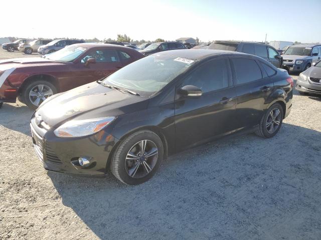 FORD FOCUS SE 2014 con VIN 1FADP3F21EL432860 - Foto de la subasta
