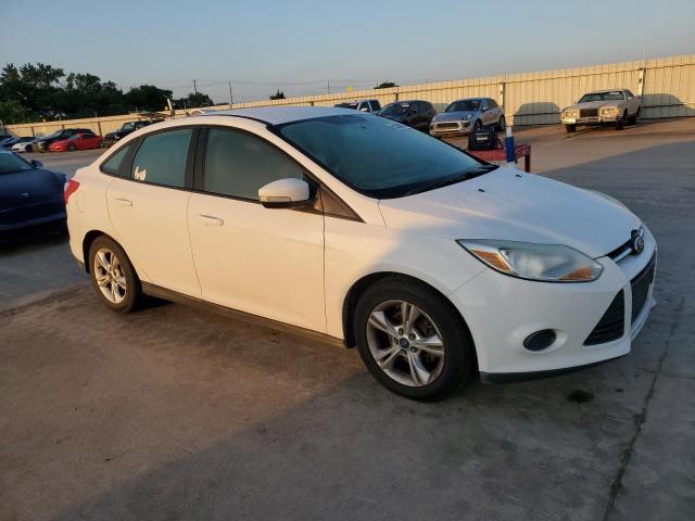 Photo 4 from auction – 2014 FORD FOCUS SE with VIN 1FADP3F24EL348578