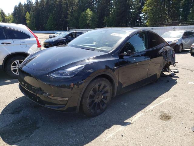 TESLA MODEL Y 2023 with VIN 7SAYGAEE3PF879100 - Photo from auction