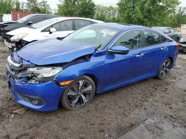 HONDA CIVIC TOUR 2016 with VIN 2HGFC1F99GH653981 - Photo from auction