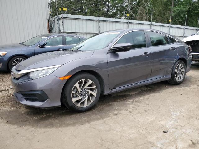 HONDA CIVIC EX 2018 with VIN 2HGFC2F7XJH588182 - Photo from auction