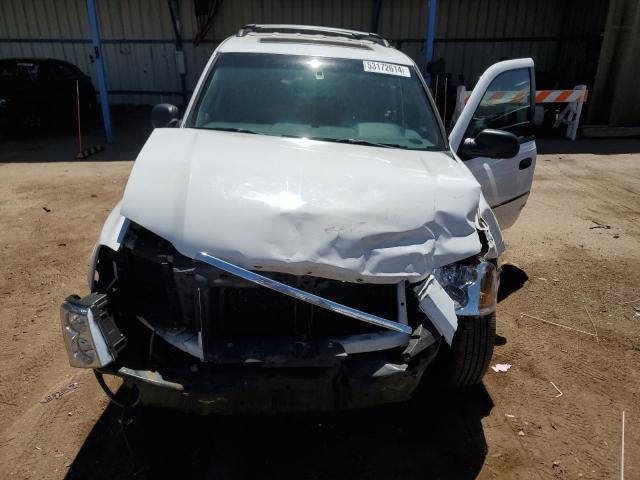 Photo 12 from auction – 2006 GMC ENVOY with VIN 1GKDT13S162332655