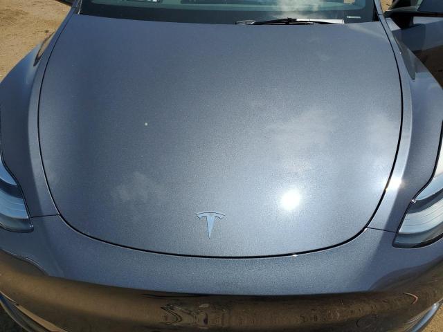 Photo 12 from auction – 2023 TESLA MODEL Y with VIN 7SAYGDEE0PA081748