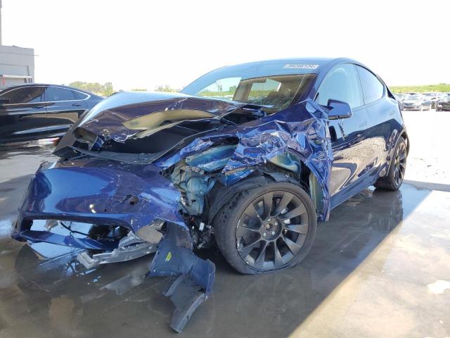 TESLA MODEL Y 2022 with VIN 7SAYGDEE7NA006817 - Photo from auction