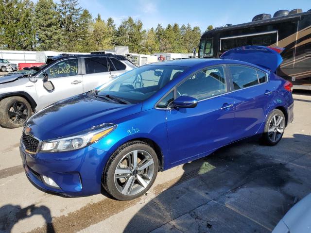 KIA FORTE EX 2017 with VIN 3KPFL4A81HE111432 - Photo from auction