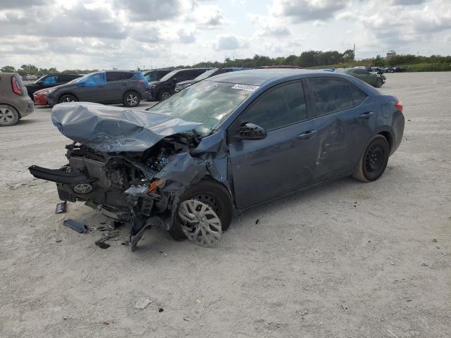 TOYOTA COROLLA L 2018 with VIN 5YFBURHE3JP799023 - Photo from auction