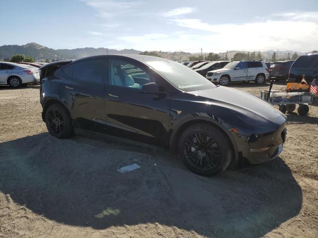 Photo 4 from auction – 2022 TESLA MODEL Y with VIN 7SAYGDEE6NF408170