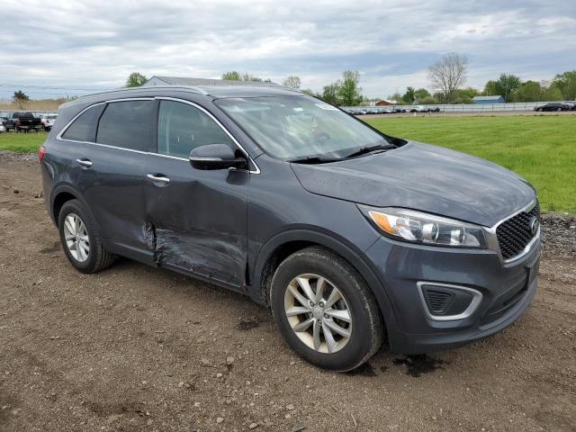Photo 4 from auction – 2016 KIA SORENTO LX with VIN 5XYPG4A34GG038135
