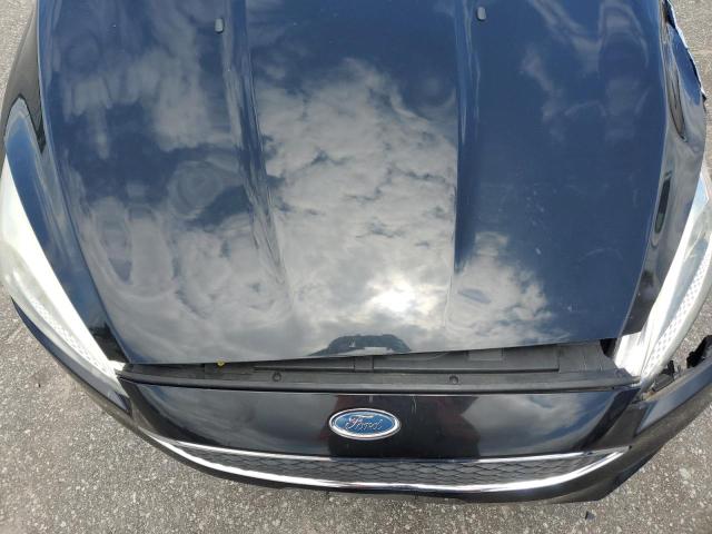 Photo 11 from auction – 2015 FORD FOCUS SE with VIN 1FADP3F26FL332965