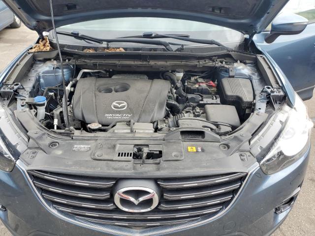 Photo 12 from auction – 2016 MAZDA CX-5 TOURI with VIN JM3KE4CY5G0909016