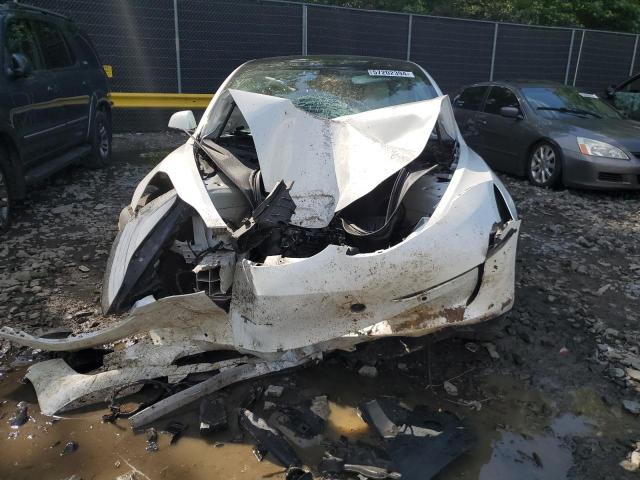 Photo 5 from auction – 2021 TESLA MODEL 3 with VIN 5YJ3E1EB1MF858566