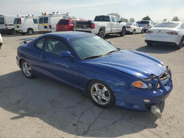 Photo 4 from auction – 2000 HYUNDAI TIBURON with VIN KMHJG35F0YU182247