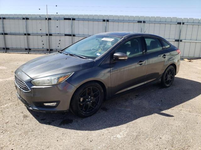 FORD FOCUS SE 2016 with VIN 1FADP3F29GL374337 - Photo from auction