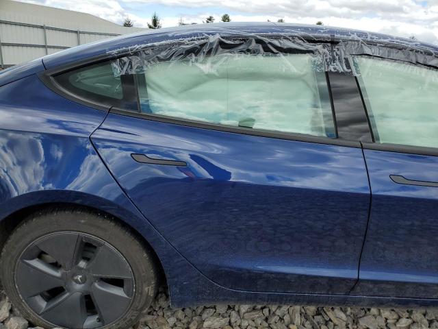 Photo 11 from auction – 2022 TESLA MODEL 3 with VIN 5YJ3E1EB7NF207041