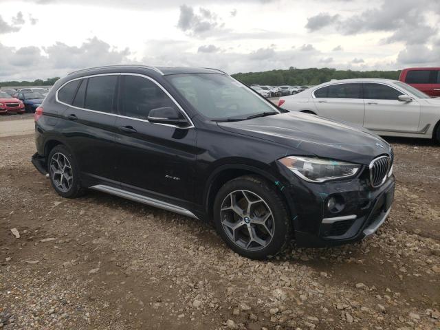 Photo 4 from auction – 2017 BMW X1 XDRIVE2 with VIN WBXHT3C3XH5F71940