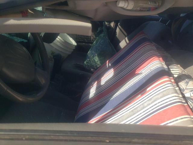 Photo 7 from auction – 1999 CHEVROLET TRACKER with VIN 2CNBJ13C0X6911475
