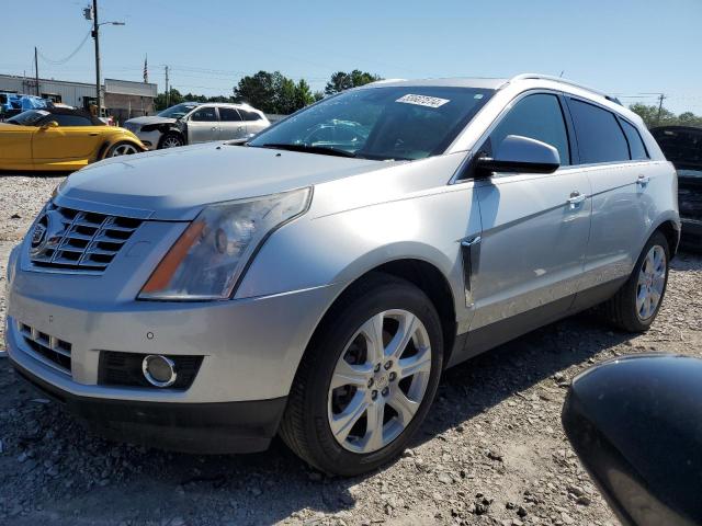 CADILLAC SRX PERFOR 2013 with VIN 3GYFNDE31DS615137 - Photo from auction
