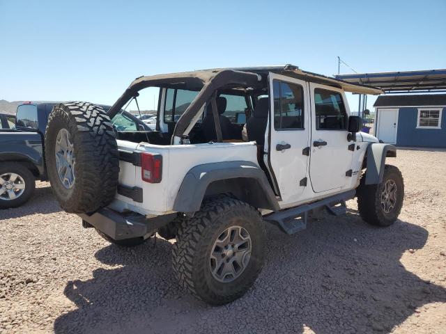 Photo 3 from auction – 2014 JEEP WRANGLER U with VIN 1C4BJWDG1EL104549