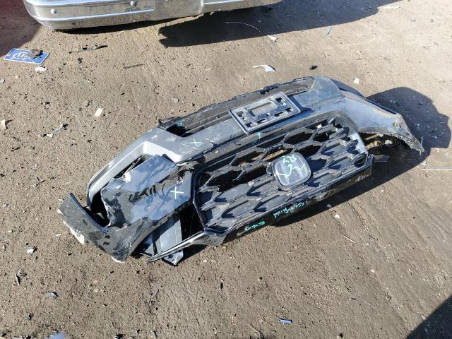 Photo 12 from auction – 2022 HONDA PASSPORT E with VIN 5FNYF8H07NB004138