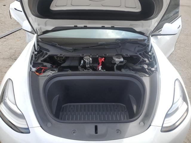 Photo 11 from auction – 2023 TESLA MODEL Y with VIN 7SAYGDEE6PA083665