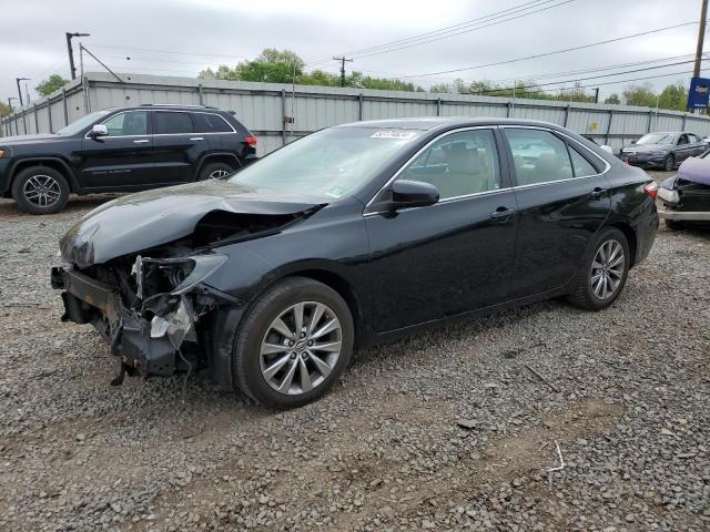 TOYOTA CAMRY LE 2016 with VIN 4T1BF1FK0GU528075 - Photo from auction
