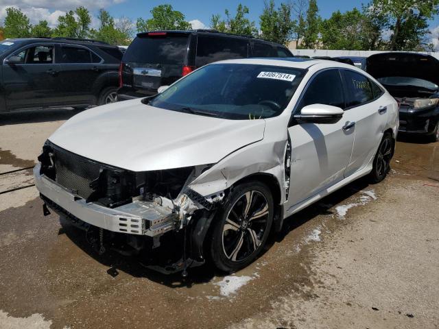 HONDA CIVIC TOUR 2017 with VIN 19XFC1F97HE013831 - Photo from auction