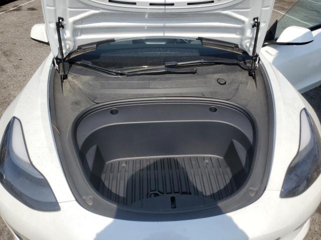 Photo 11 from auction – 2022 TESLA MODEL 3 with VIN 5YJ3E1EB4NF307906
