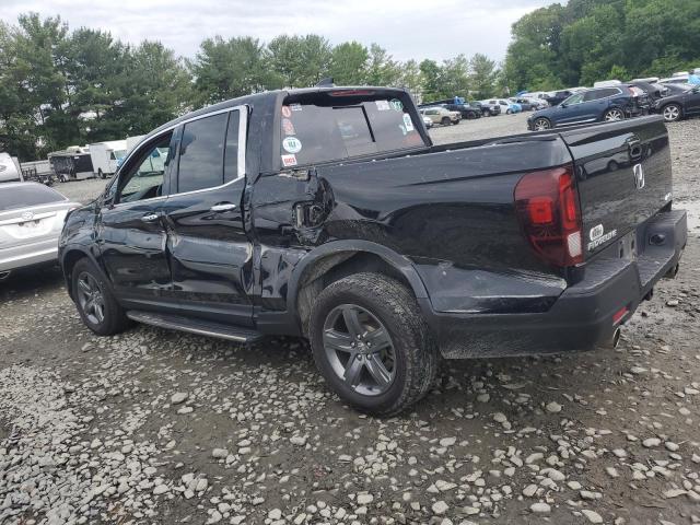 Photo 2 from auction – 2022 HONDA RIDGELINE with VIN 5FPYK3F75NB024961
