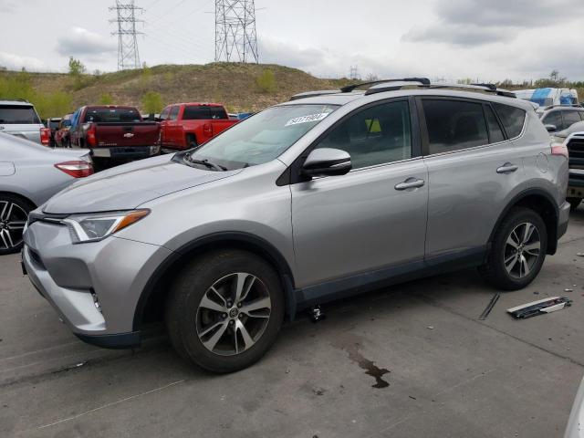 TOYOTA RAV4 XLE 2017 with VIN 2T3RFREV3HW594346 - Photo from auction