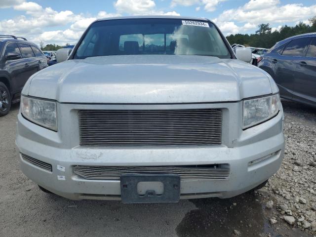 Photo 5 from auction – 2010 HONDA RIDGELINE with VIN 5FPYK1F42AB004526