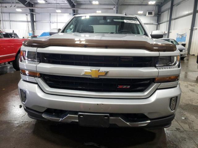 Photo 5 from auction – 2018 CHEVROLET SILVERADO with VIN 3GCUKREC5JG298027