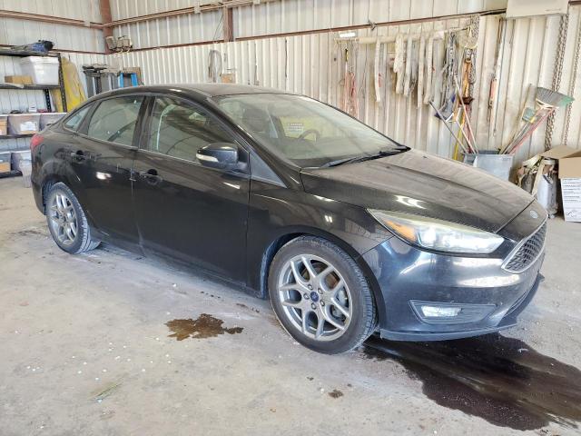 Photo 4 from auction – 2015 FORD FOCUS SE with VIN 1FADP3F25FL318538