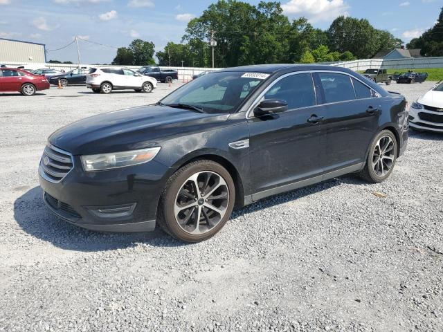 FORD TAURUS SEL 2014 with VIN 1FAHP2E86EG177553 - Photo from auction