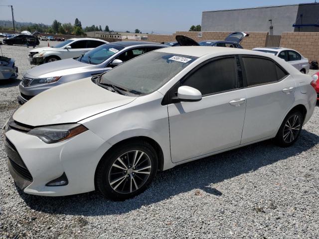 TOYOTA COROLLA L 2017 with VIN 5YFBURHE1HP674631 - Photo from auction