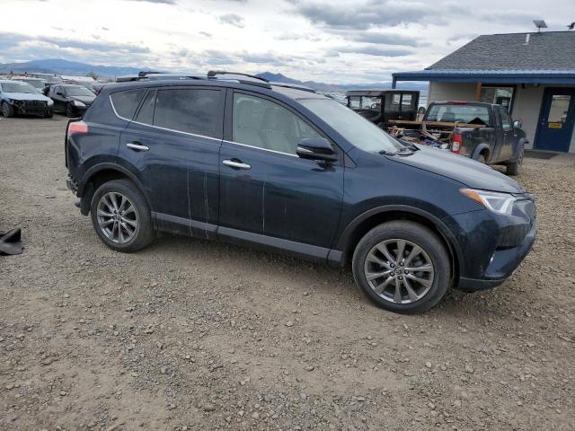 Photo 4 from auction – 2018 TOYOTA RAV4 LIMIT with VIN JTMDFREV0JJ186370