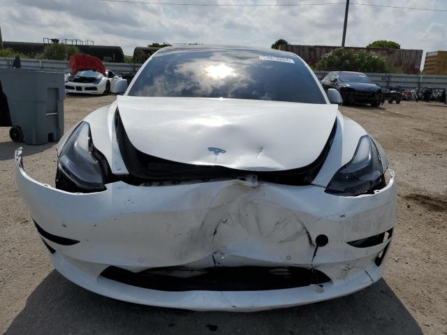 Photo 5 from auction – 2022 TESLA MODEL 3 with VIN 5YJ3E1EC5NF166997