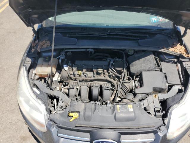 Photo 11 from auction – 2014 FORD FOCUS SE with VIN 1FADP3F27EL353127