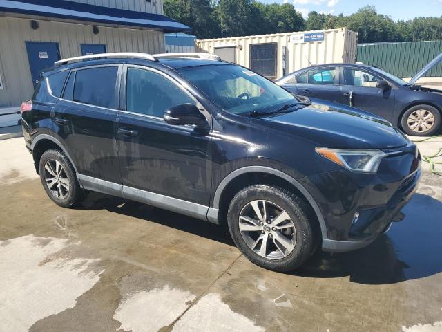 Photo 4 from auction – 2017 TOYOTA RAV4 XLE with VIN 2T3RFREV4HW637155