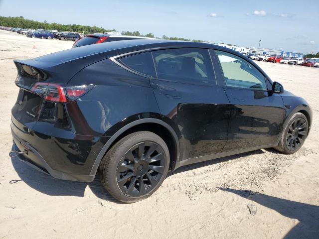 Photo 3 from auction – 2022 TESLA MODEL Y with VIN 7SAYGAEE2NF524271