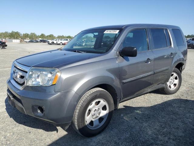 HONDA PILOT LX 2011 with VIN 5FNYF3H29BB054832 - Photo from auction
