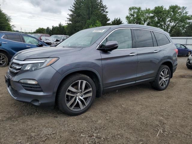 HONDA PILOT ELIT 2016 with VIN 5FNYF6H05GB123619 - Photo from auction