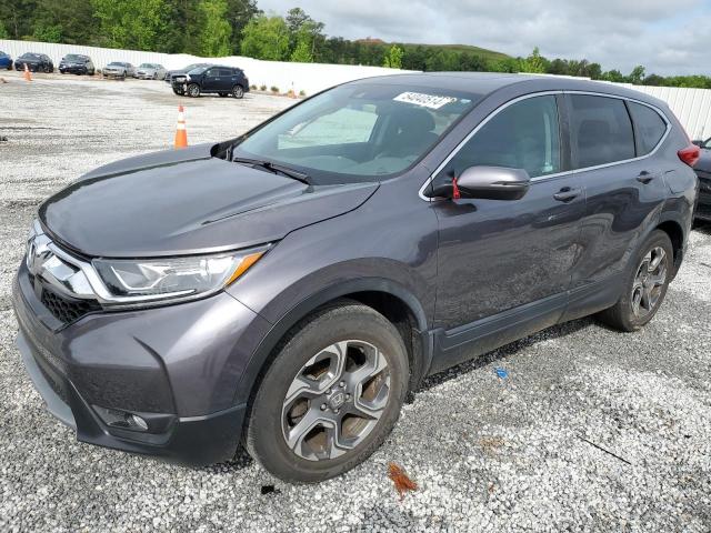 HONDA CR-V EX 2018 with VIN 5J6RW1H52JA010868 - Photo from auction