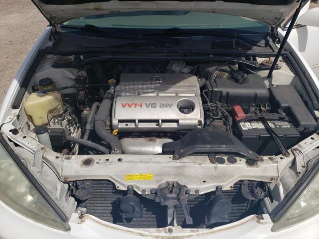 Photo 11 from auction – 2003 TOYOTA CAMRY LE with VIN JTDBF32KX30136759