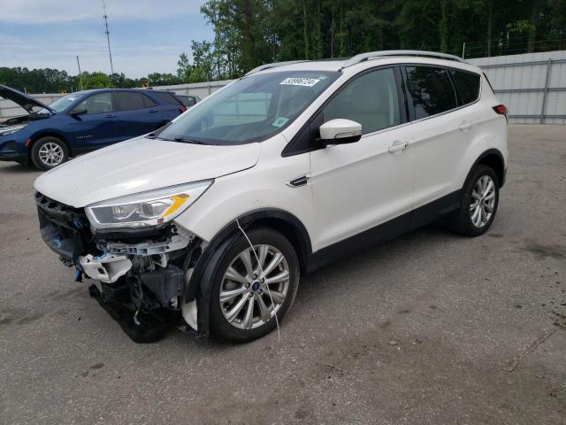 FORD ESCAPE TIT 2017 with VIN 1FMCU0J98HUD86410 - Photo from auction