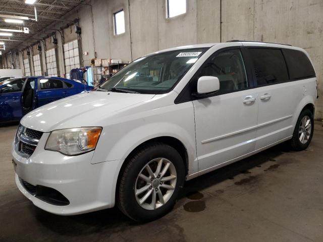 DODGE GRAND CARA 2014 with VIN 2C4RDGCGXER390552 - Photo from auction