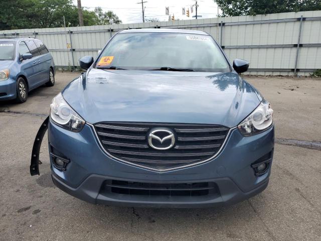 Photo 5 from auction – 2016 MAZDA CX-5 TOURI with VIN JM3KE4CY5G0909016