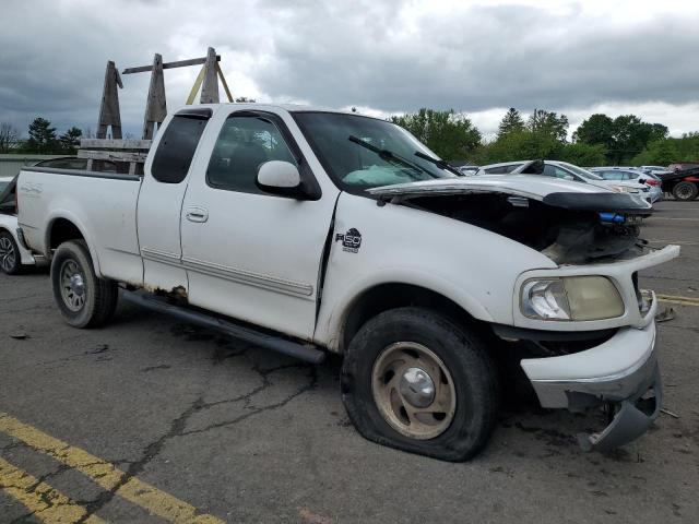 Photo 4 from auction – 2000 FORD F150 with VIN 1FTRX18L4YNB67516